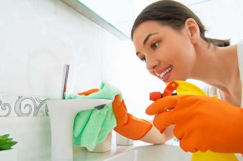 Local cleaners in Bow tidying a bright living room